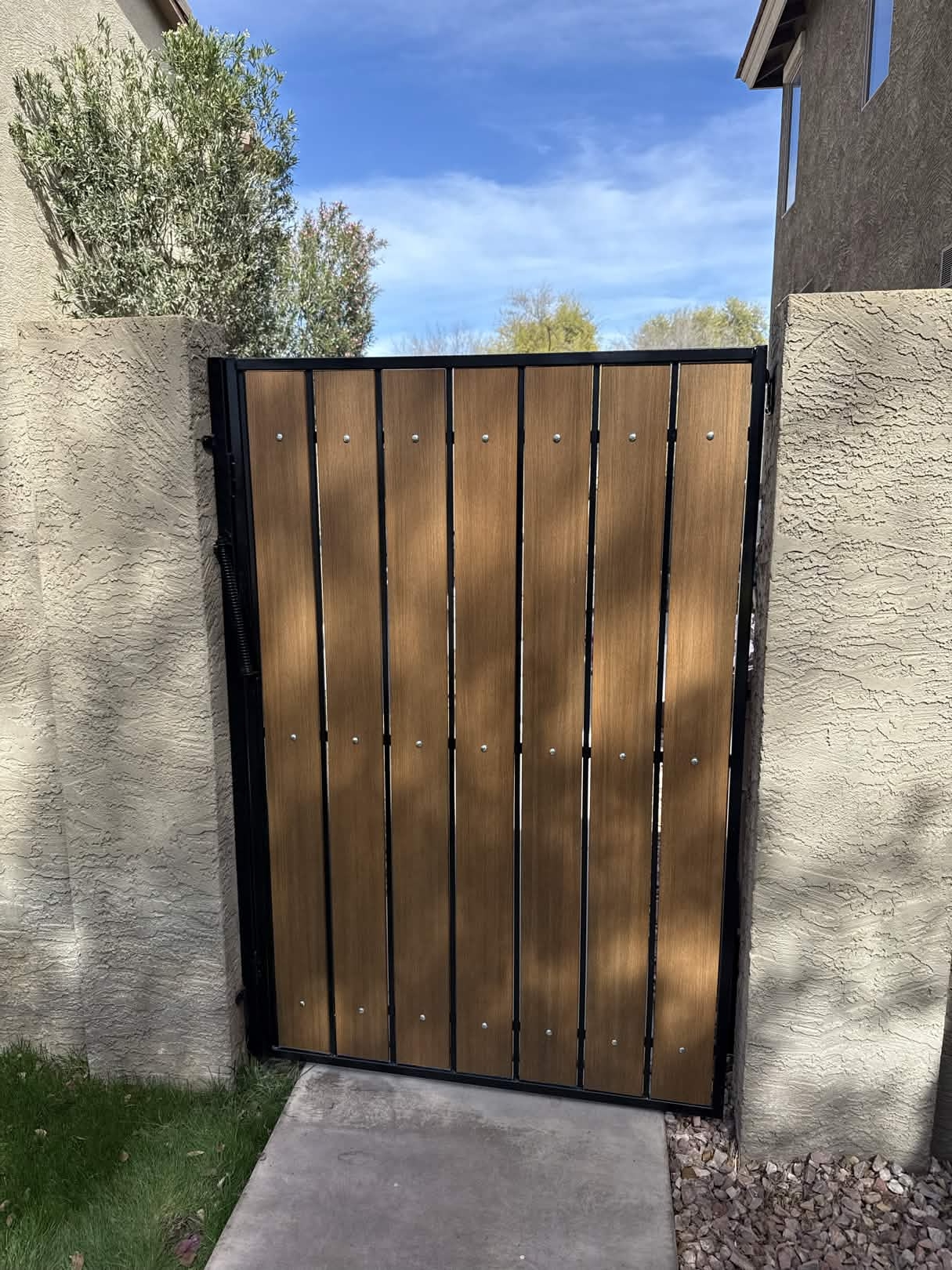 Composite wood slat gate replacement in Arizona